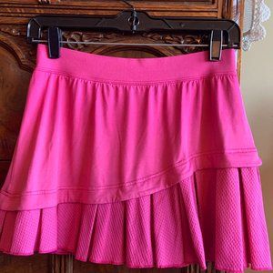 Tail pink tennis skirt